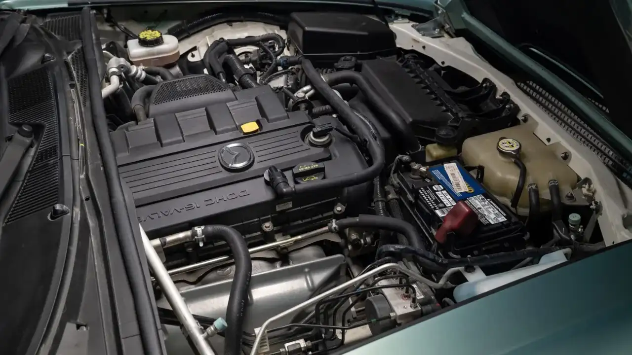 This Classic Aston Martin Is Actually A Miata Underneath