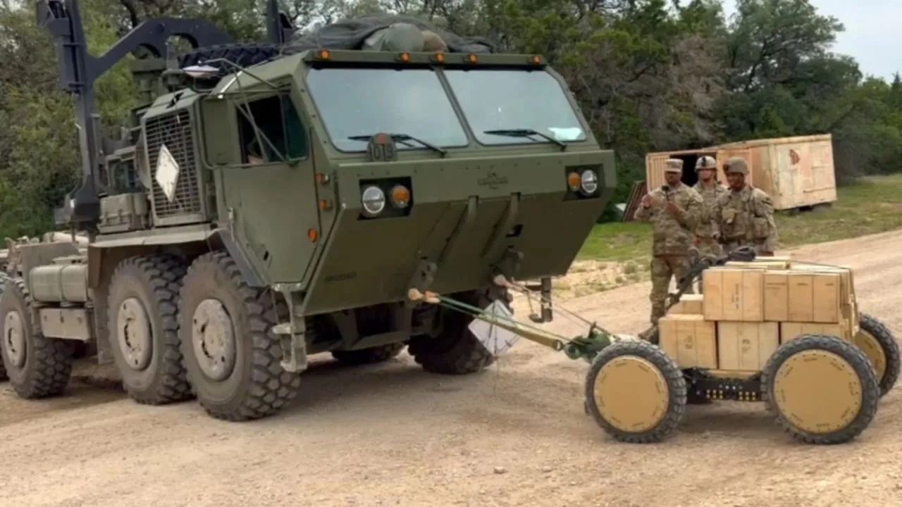 227-Kilogramm-Leichtbau-Insassenloses-Kampffahrzeug zieht 24-Tonnen-Militärtransporter
