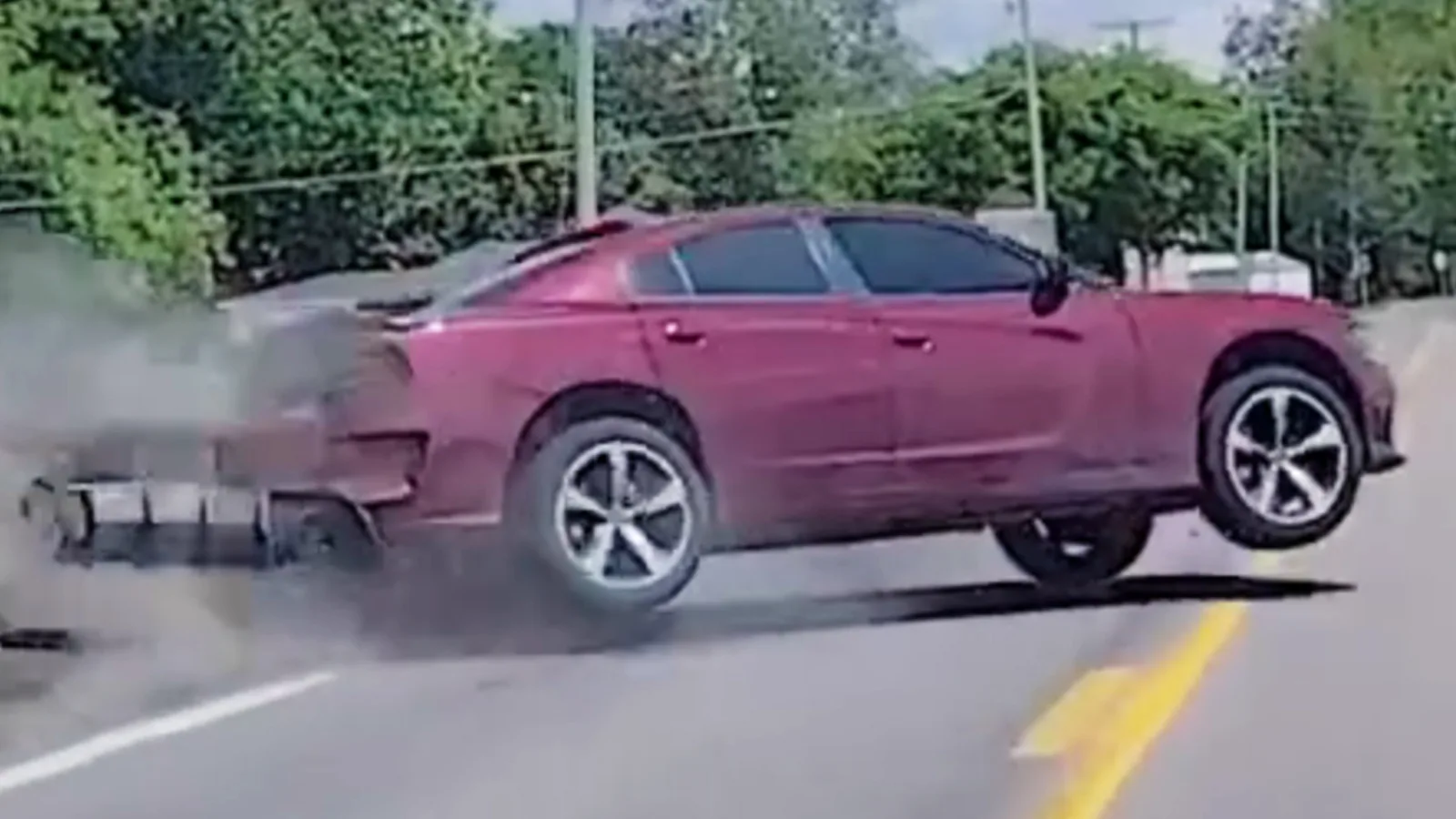 A 3-Year-Old Climbed Out Of This Flipped Charger After His Mom Ran From Cops | Carscoops